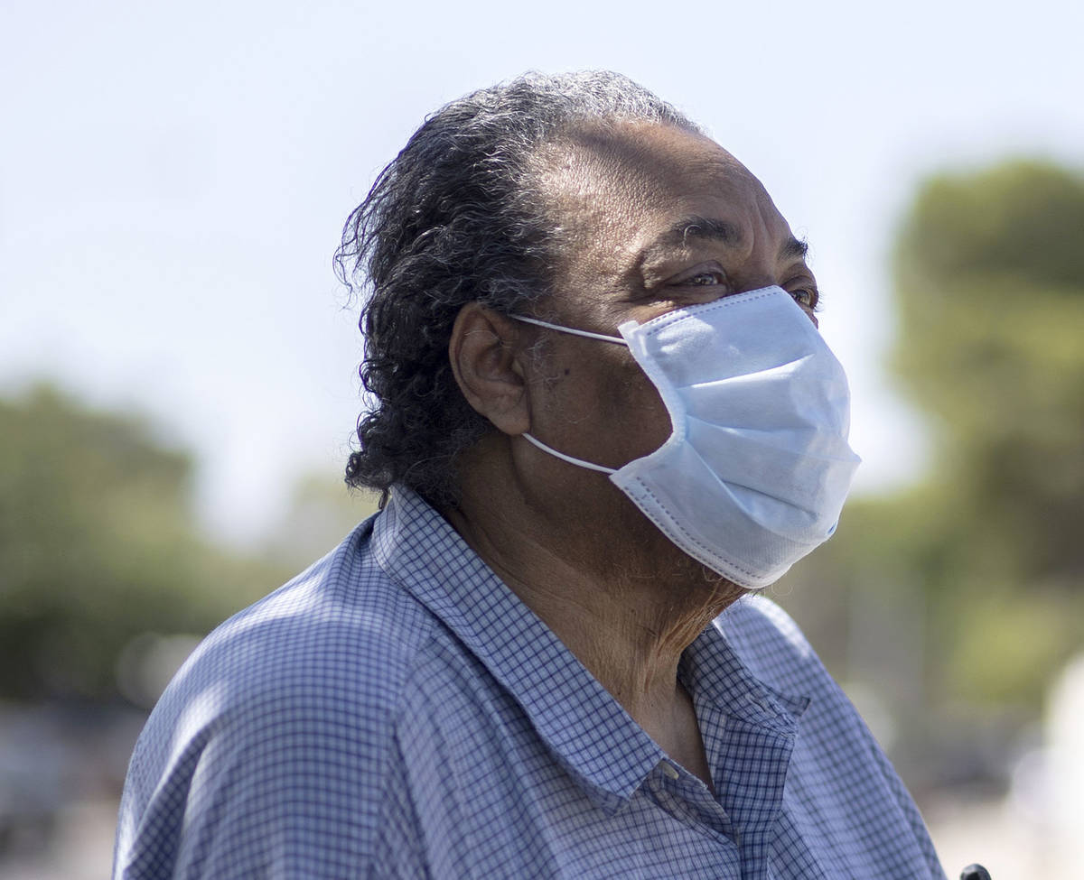 Paul Wise, a former resident of the Alpine Motel, poses for a portrait outside his new residenc ...