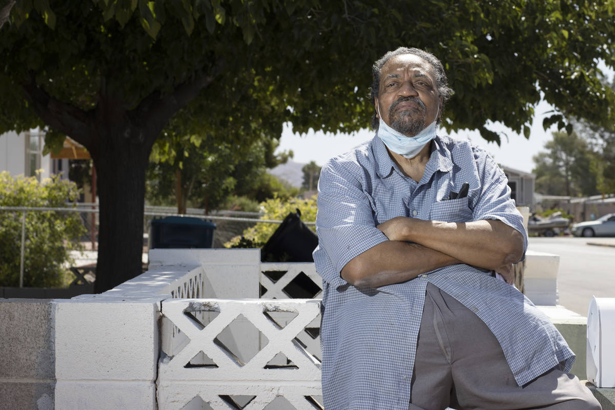 Paul Wise, a former resident of the Alpine Motel, poses for a portrait outside his new residenc ...