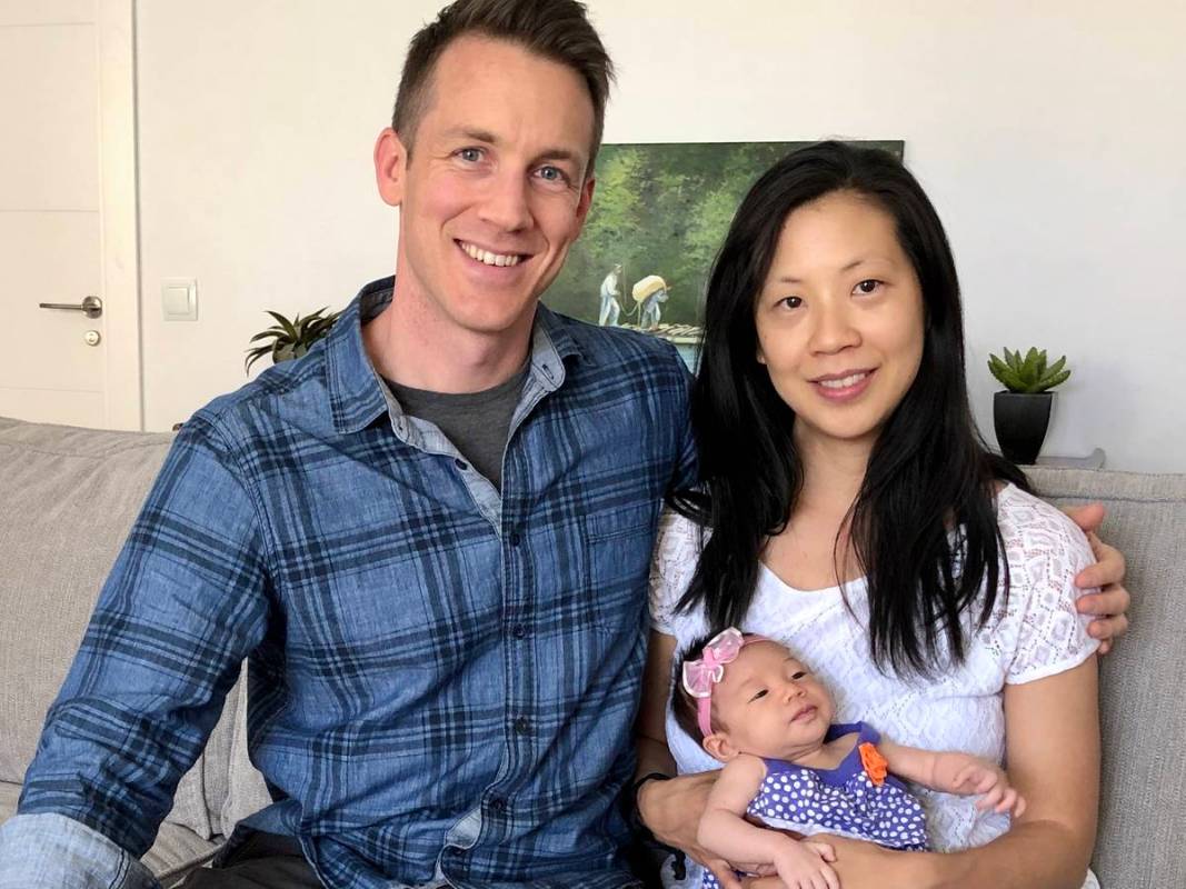 Henderson native and Air Force Maj. Chris Stein and his wife, Sarah, smile with their newborn d ...
