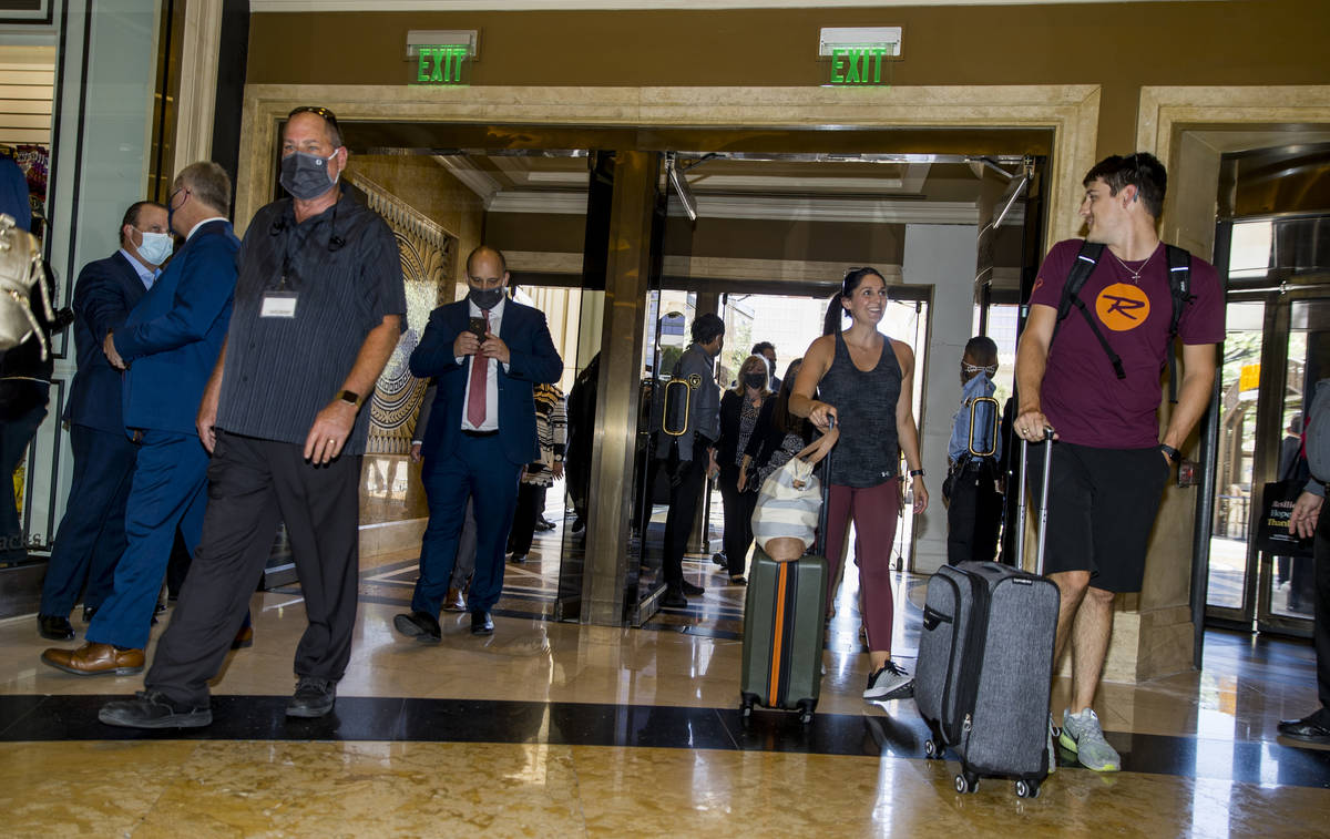 Invited guests and tourist stream into the main lobby following the reopening ceremonies at Cae ...