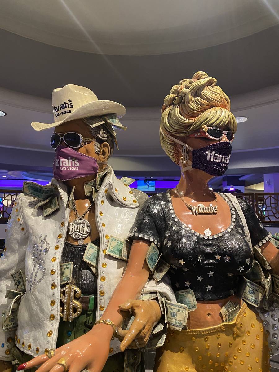 The masked statues of the Greenbacks, Buck (left) and Winnie, shown Thursday, June 18, 2020. (J ...