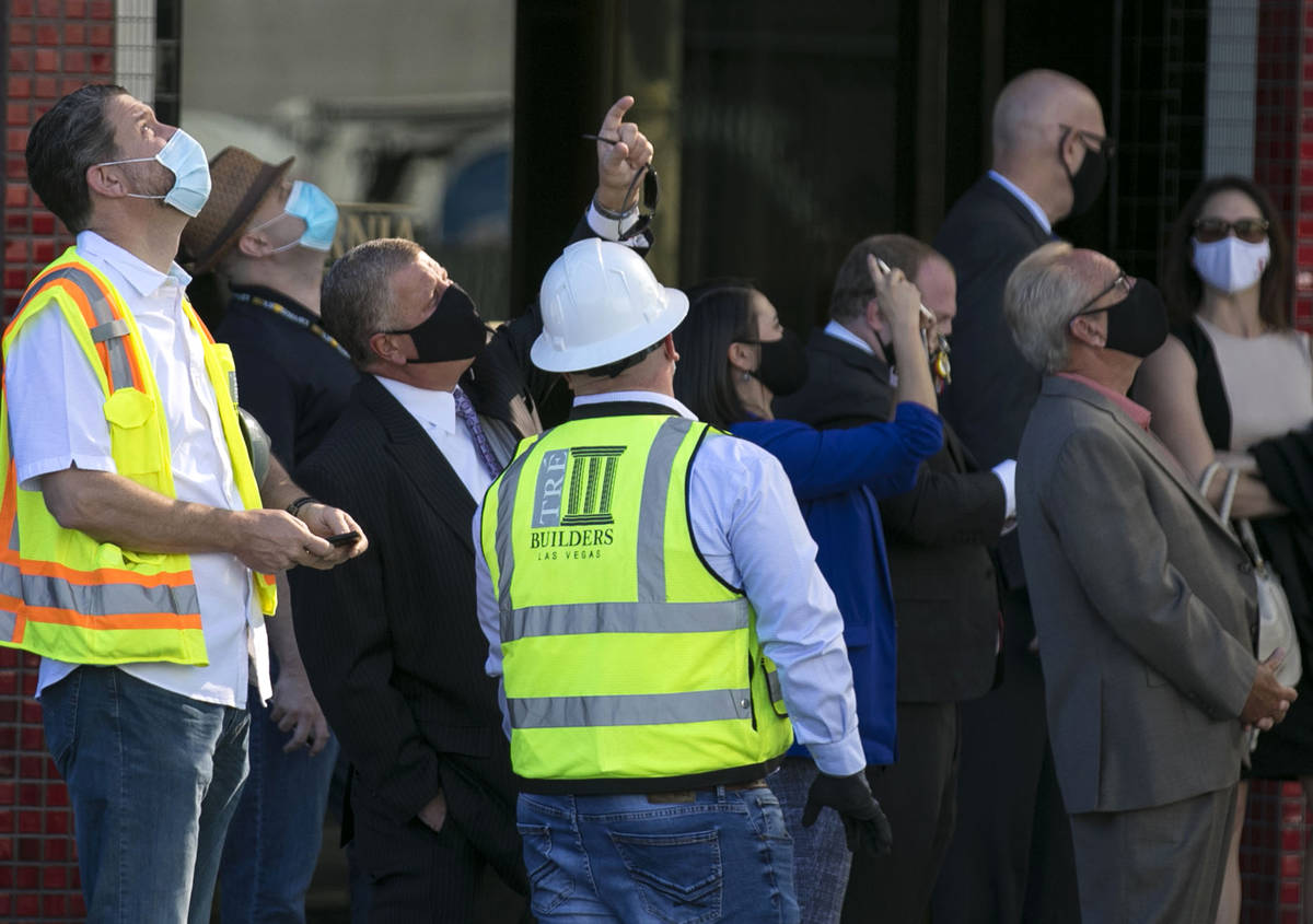 Attendees, including Derek Stevens, second left, CEO and developer of Circa Resort and Casino, ...