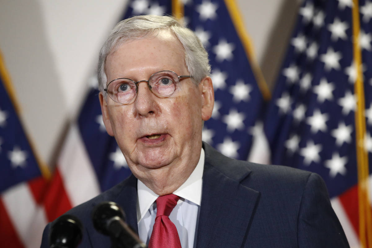 In a May 19, 2020, photo, Senate Majority Leader Mitch McConnell of Ky., speaks with reporters ...