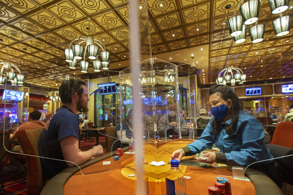 The Bellagio poker room is packed after being outfitted with shielding and upgraded sanitation ...