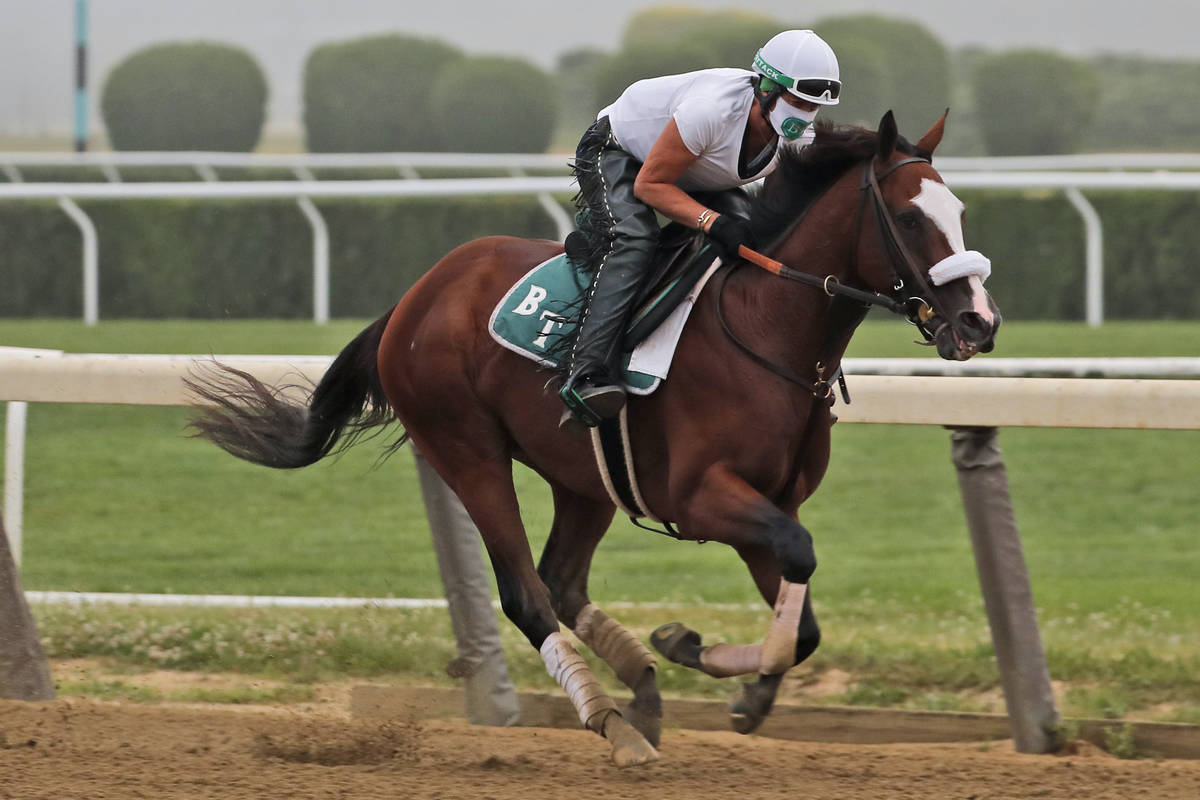 Robin Smullen rides Tiz the Law during a workout at Belmont Park in Elmont, N.Y., Friday, June ...