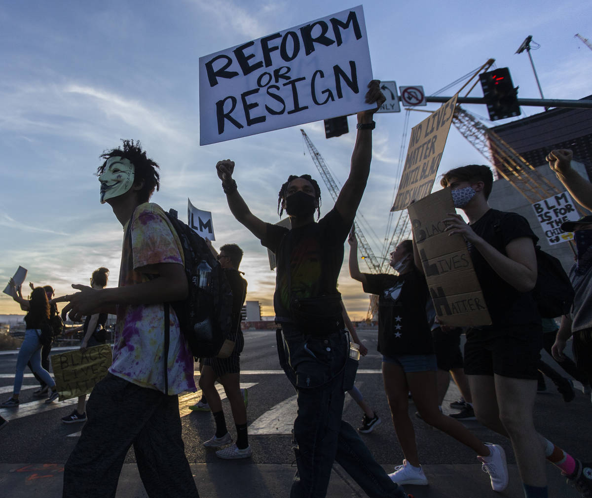 Protesters march south on the Strip during a Juneteenth rally organized by Black Lives Matter o ...