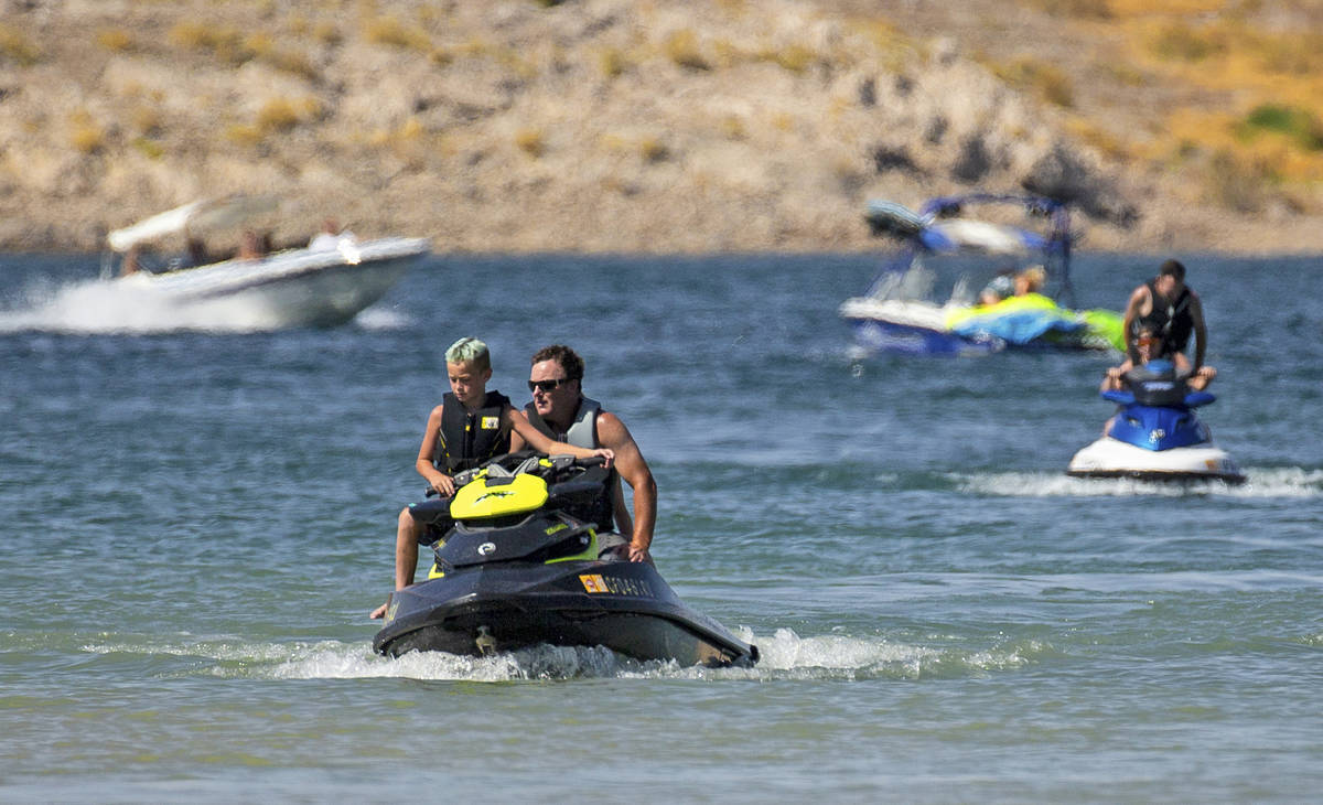 People enjoy jet skiing and boating at Lake Mead on Saturday, June 20, 2020, in Boulder City. N ...