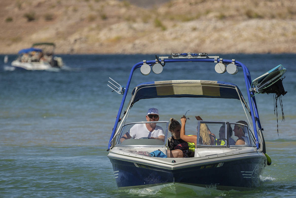 People enjoy boating at Lake Mead on Saturday, June 20, 2020, in Boulder City. Nevada is one of ...