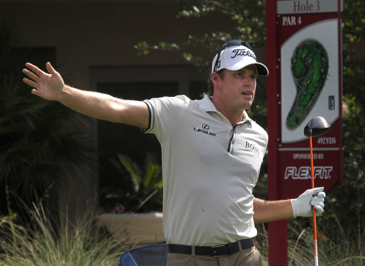 Nick Watney tries to guide his shot after teeing off on the third hole during the annual Justin ...