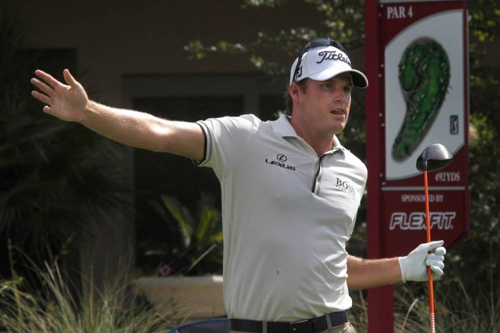 Nick Watney tries to guide his shot after teeing off on the third hole during the annual Justin ...