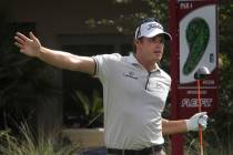 Nick Watney tries to guide his shot after teeing off on the third hole during the annual Justin ...