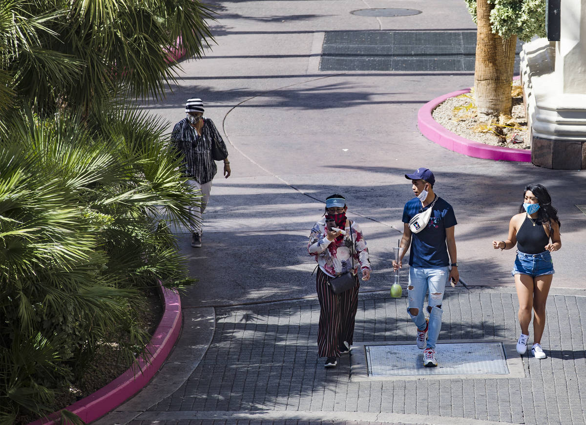 Visitors walk the Strip in Las Vegas, Sunday, June 21, 2020. (Rachel Aston/Las Vegas Review-Jou ...