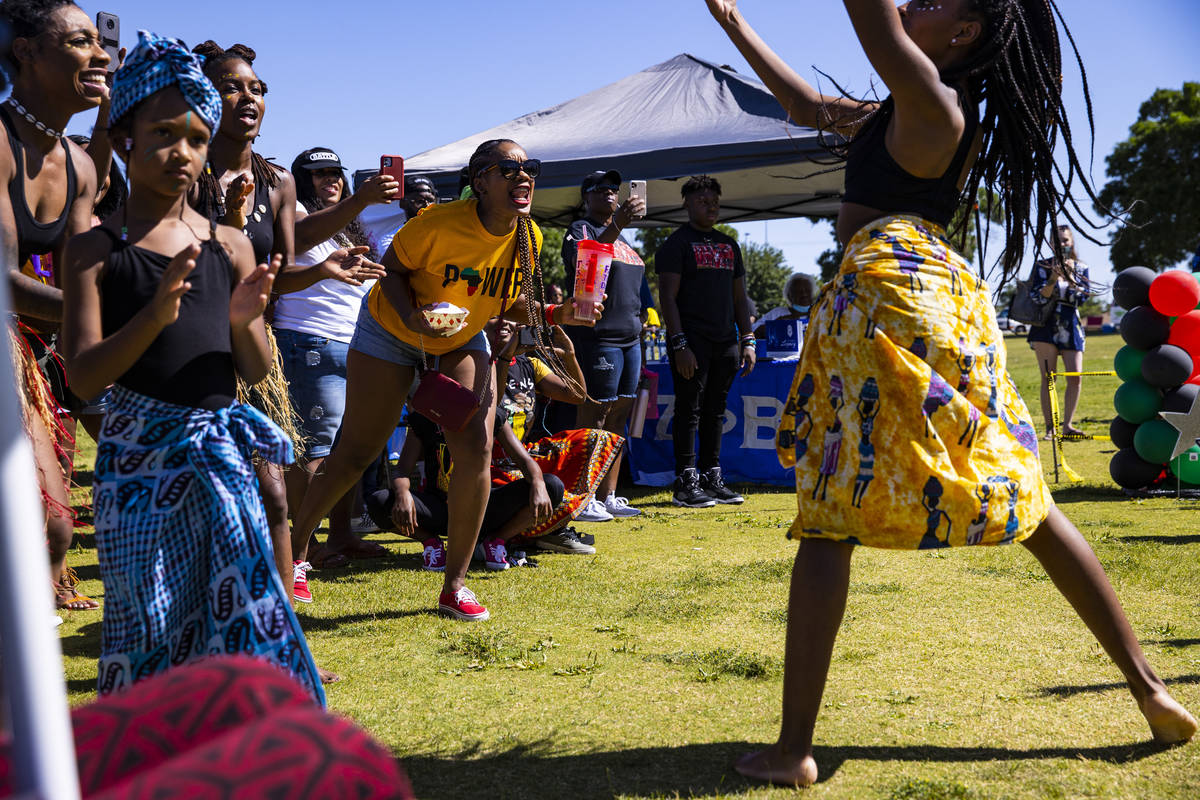 The crowd reacts as members of Olabisi African Dance & Drum Ensemble perform during a Junet ...