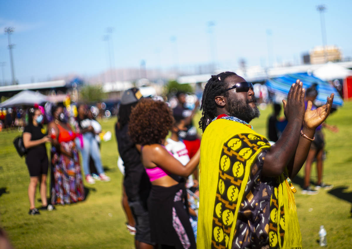 Trice Be Phantom Magnetiq, of Las Vegas, claps after a performance by Brittany Soul during a Ju ...