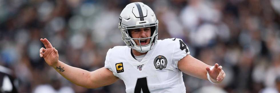 Oakland Raiders quarterback Derek Carr in action during the second half of an NFL football game ...