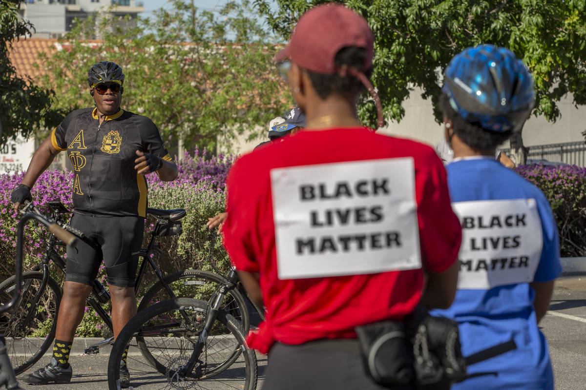 Las Vegas Councilman Cedric Crear speaks to participants as Black Lives Matter holds a bike rid ...