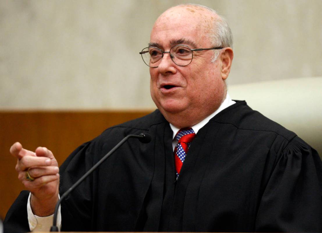 FILE - In this May 1, 2008 file photo, U.S. District Judge Royce C. Lamberth is seen during a c ...