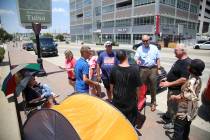FILE - In this June 15, 2020, file photo Donald Trump supporters gather outside the BOK Center ...