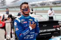 Bubba Wallace stands for the national anthem before a NASCAR Cup Series auto race Sunday, June ...