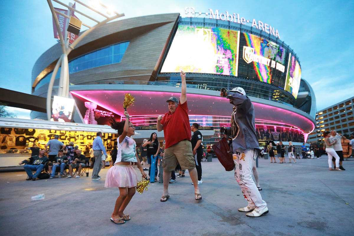 Fans celebrate after the Vegas Golden Knights defeated the San Jose Sharks during a watch party ...