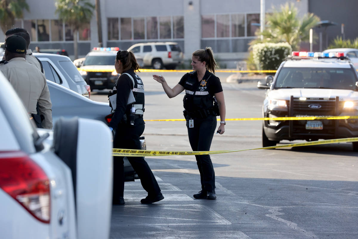 Las Vegas police investigate a shooting at the 99 Cents Only Store on North Rancho Drive at Che ...