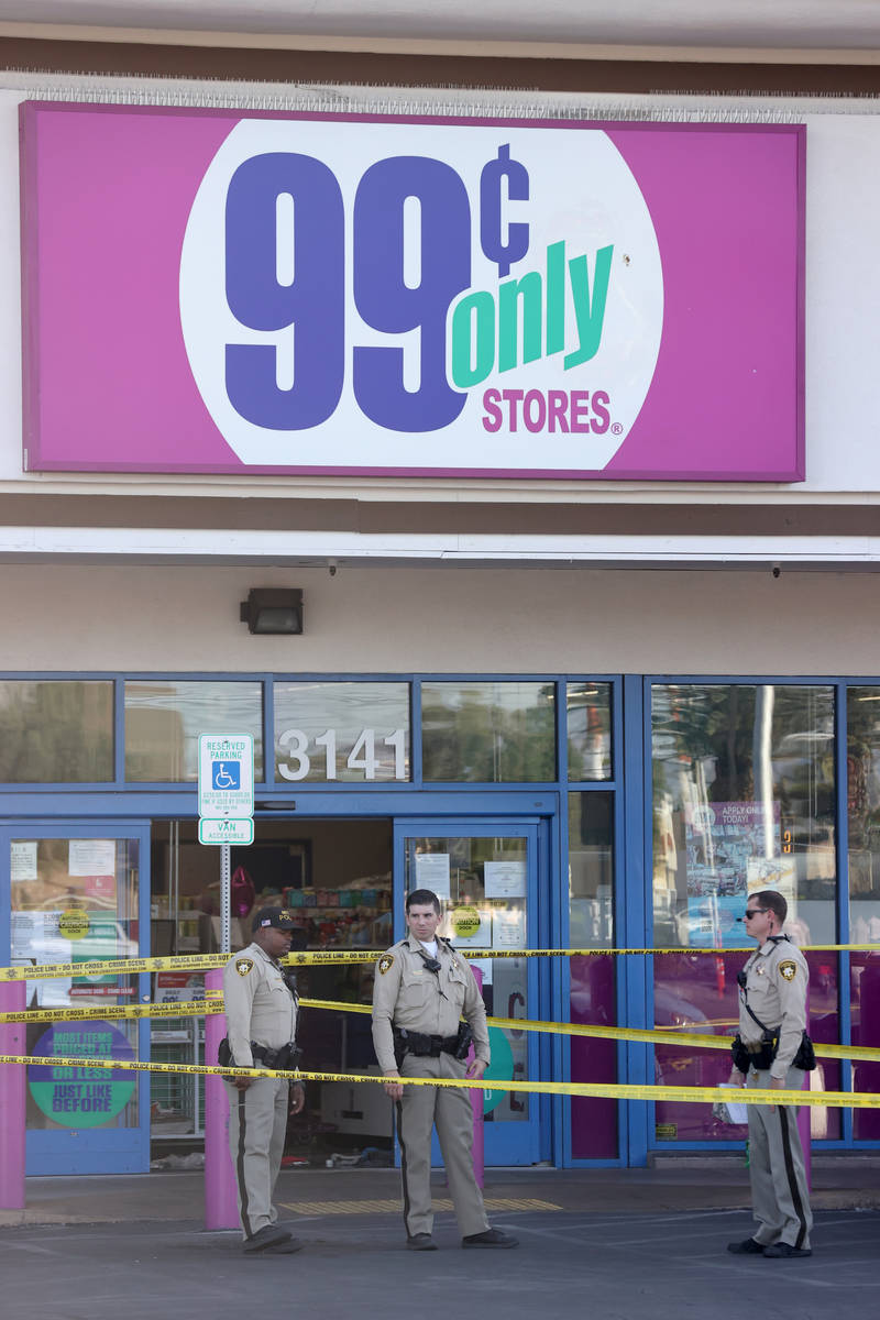 Las Vegas police investigate a shooting at the 99 Cents Only Store on North Rancho Drive at Che ...