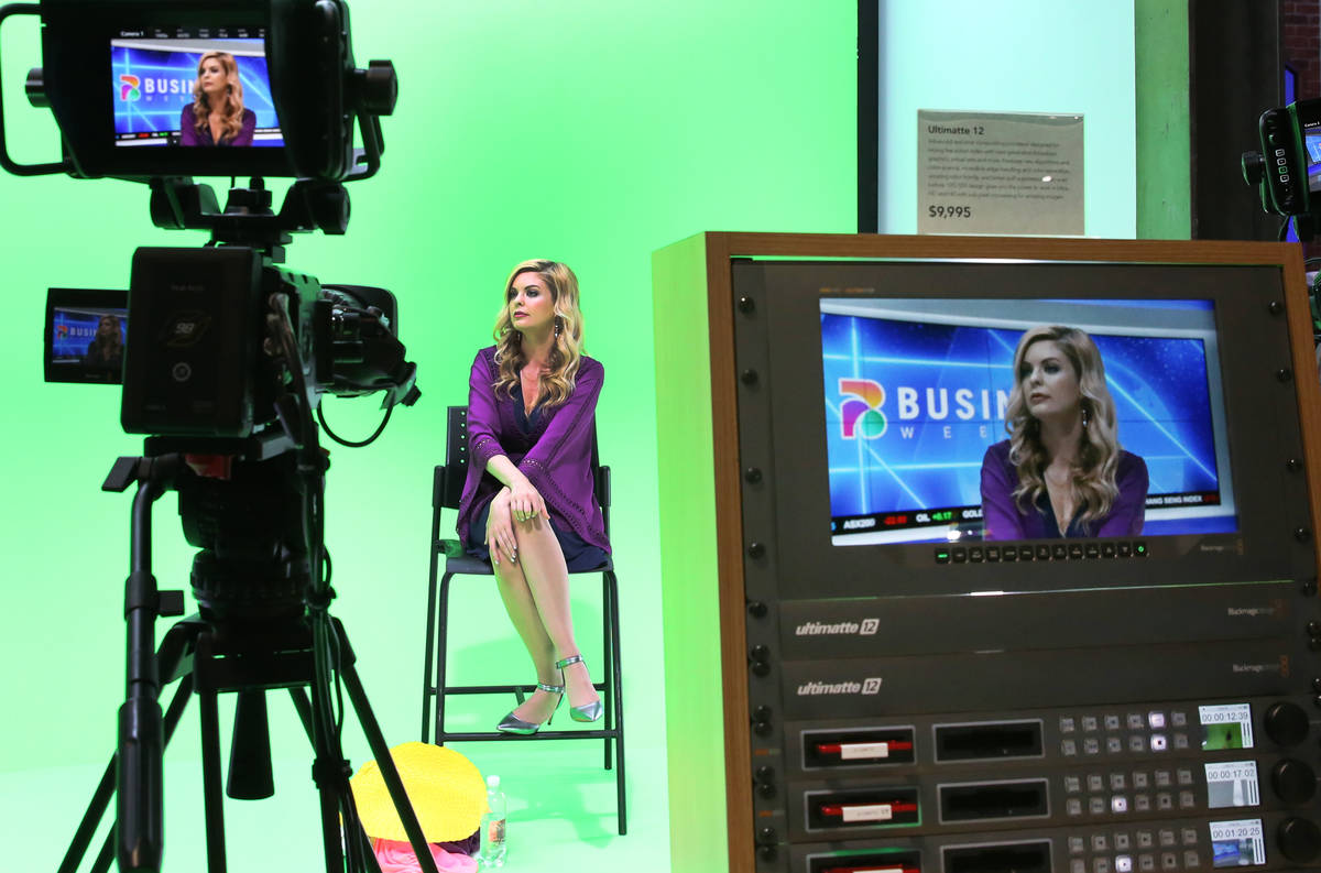 A model is displayed on a screen of Blackmagic's design, Ultimatte12, right, an advanced real t ...
