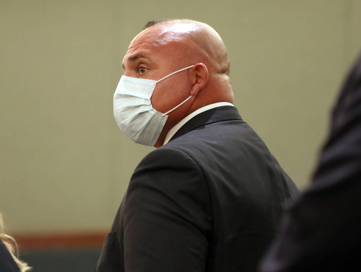 Las Vegas police Detective Lawrence Rinetti Jr, appears in court for a hearing at the Regional ...