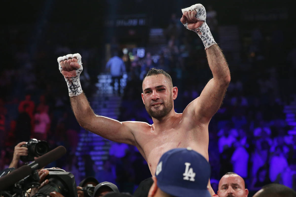 Jose Pedraza celebrates his unanimous decision victory against Antonio Moran in the WBO lightwe ...