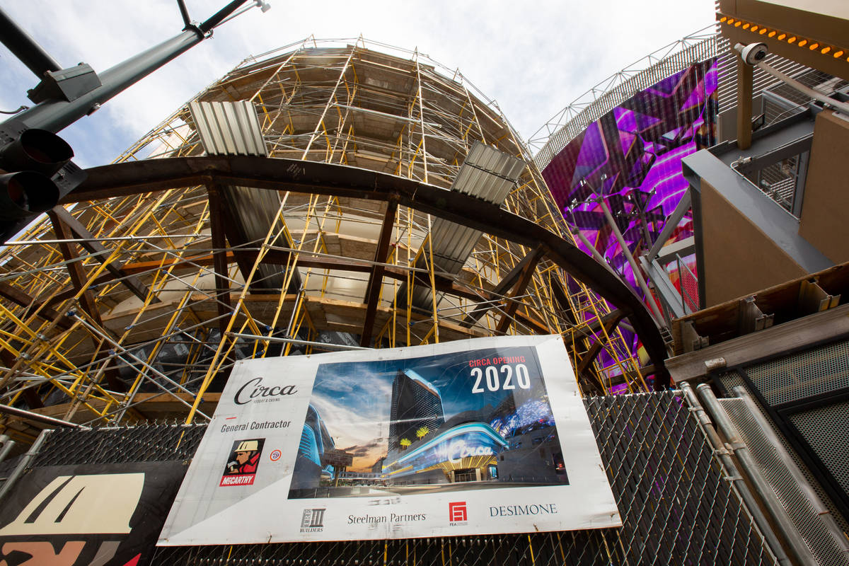 A sign advertising the opening of Circa is seen on the Circa construction site next to the Free ...