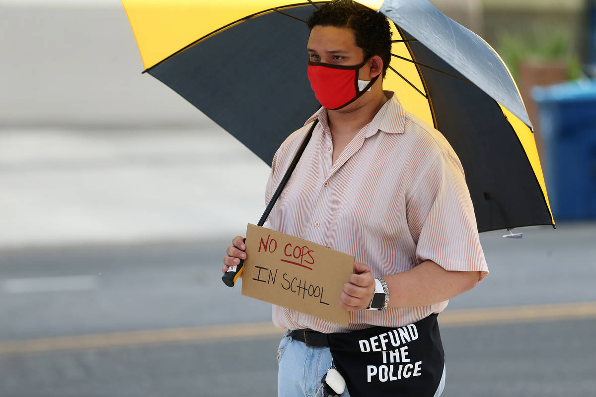 Marcos Maderos, 17, a senior in high school, attends a protest organized by Make The Road Nevad ...