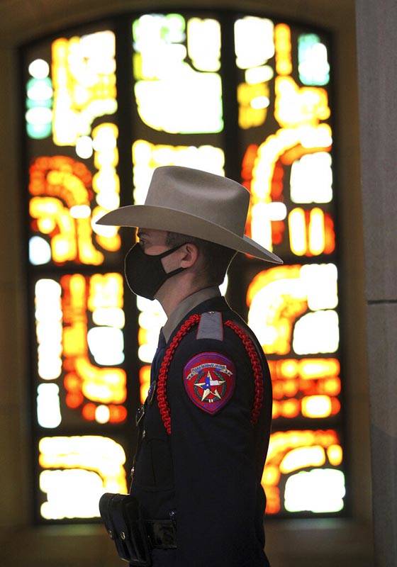 Robert Jackson, with Texas Department of Public Safety, attends the Blue Mass at the Basilica o ...