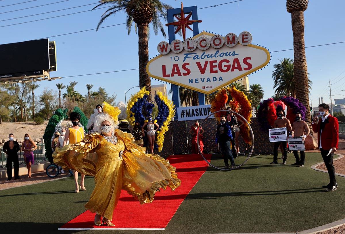 Jim McCoy as Auntie Norma, walks the red carpet at the Welcome to Fabulous Las Vegas sign on th ...