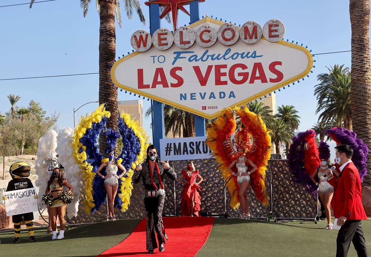Elvis Impersonator Brendan Paul walks the red carpet at the Welcome to Fabulous Las Vegas sign ...