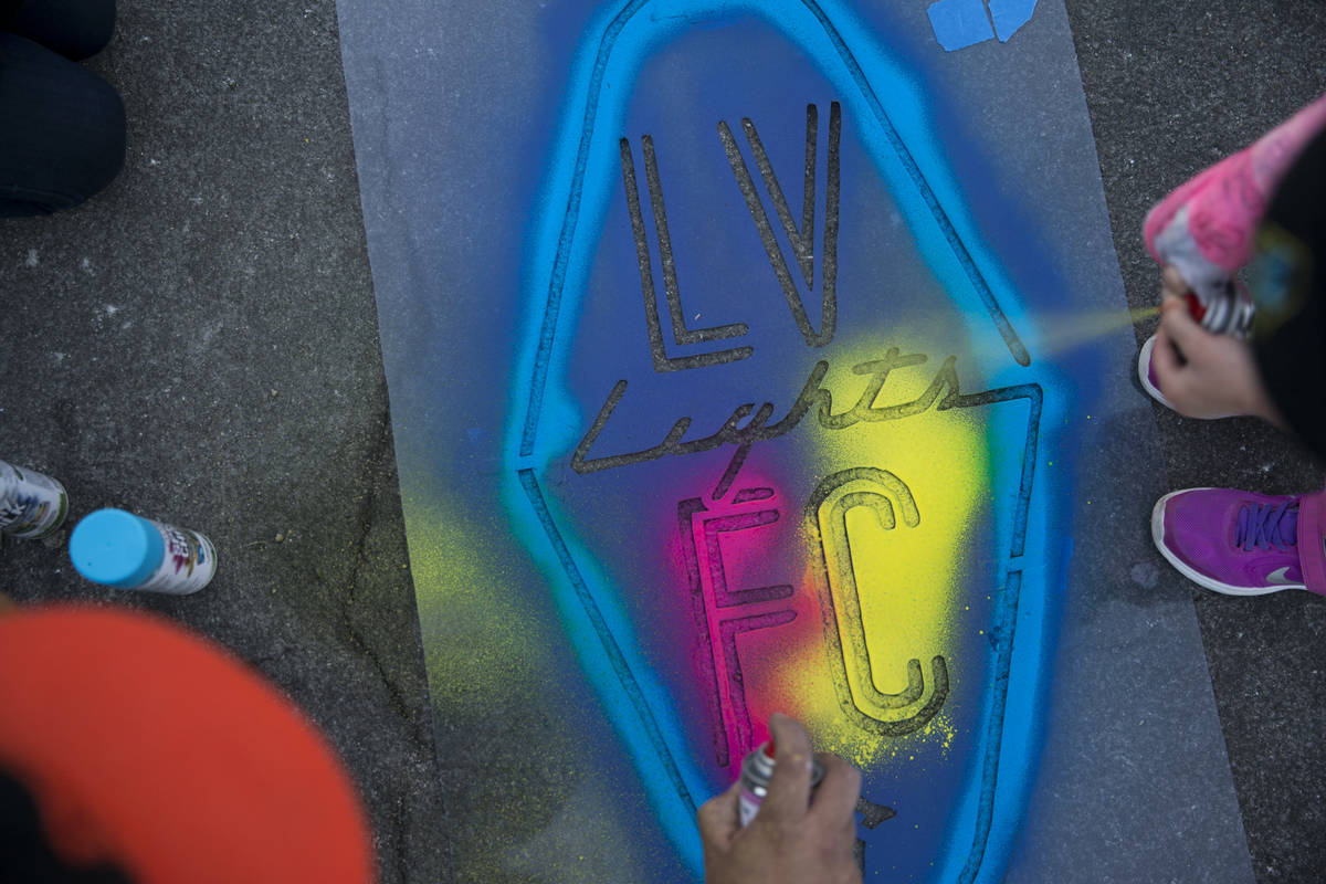 A Las Vegas Lights FC logo is sprayed on the ground outside of Cashman Field in Las Vegas, Satu ...