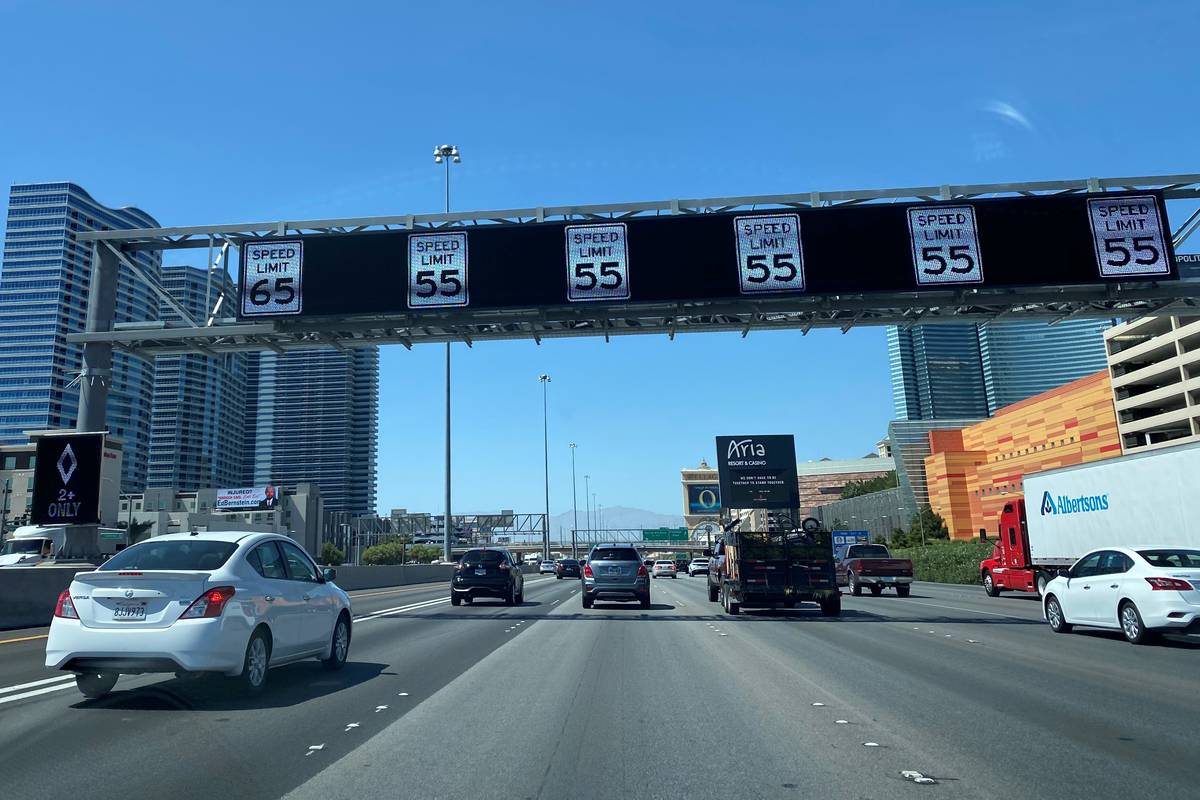 A dynamic message board sign on Interstate 15 northbound displays reduced speed limits due to a ...