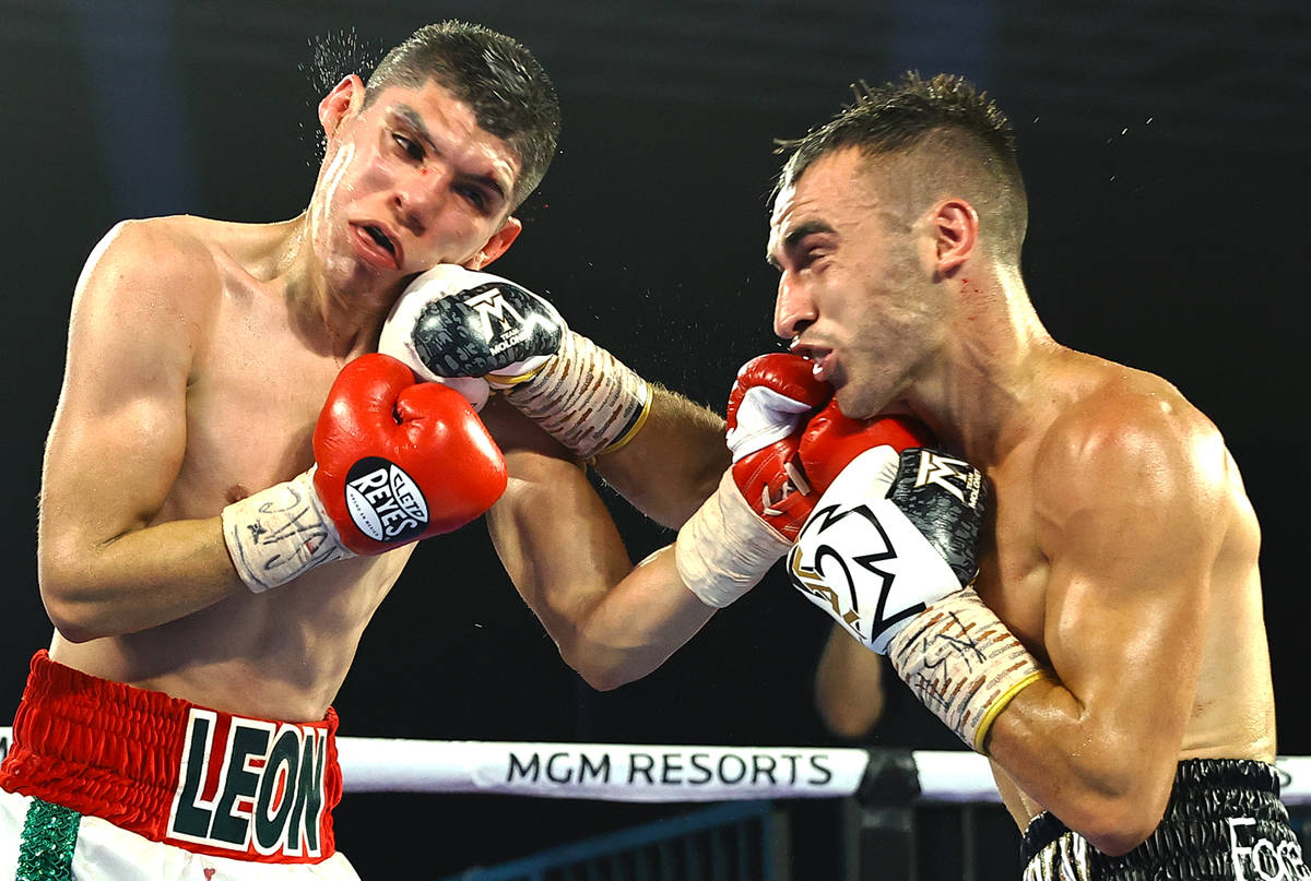 Jason Moloney wins by TKO to salvage week for family Boxing Sports