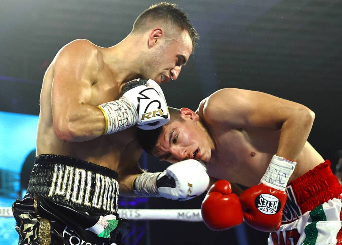 Jason Moloney, left, and Leonardo Baez fight Thursday, June 25, 2020, on a Top Rank boxing card ...