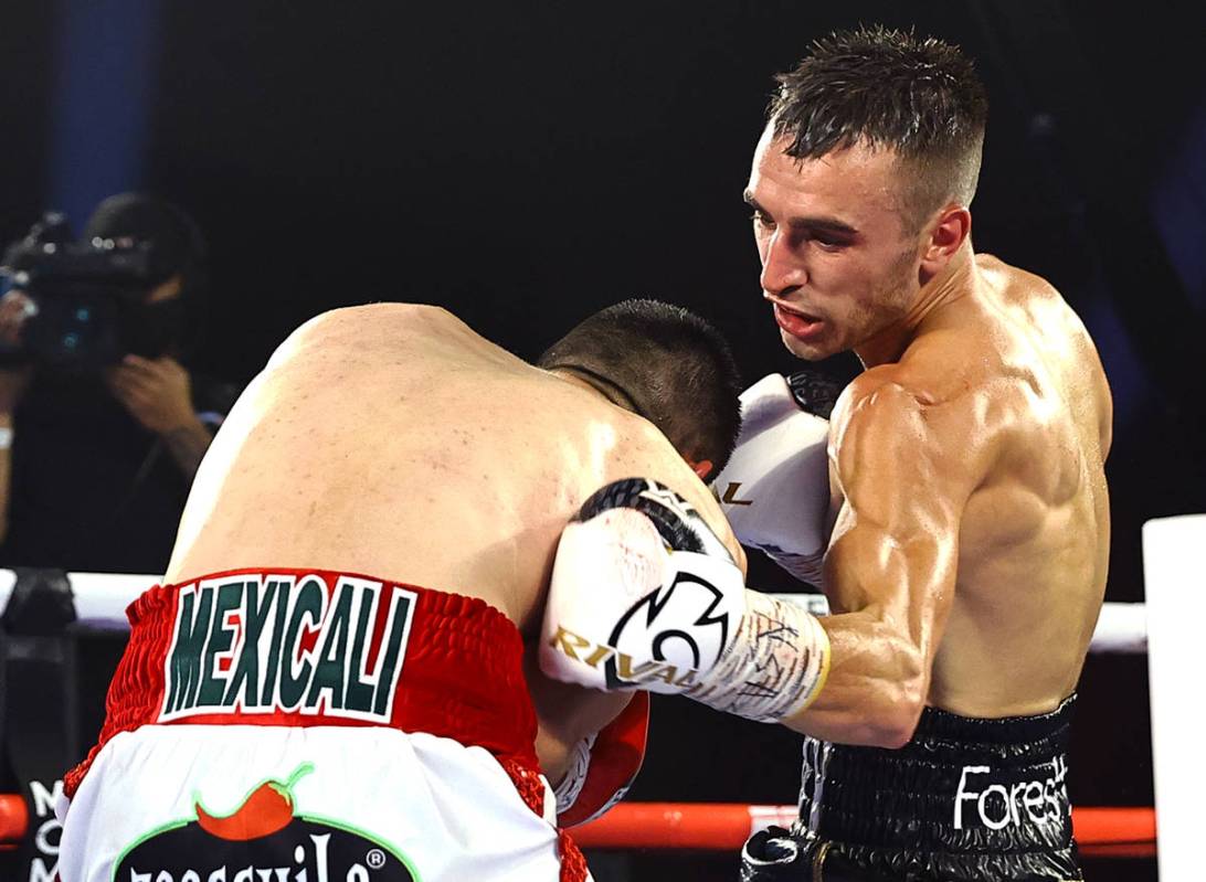 Jason Moloney, right, and Leonardo Baez fight Thursday, June 25, 2020, on a Top Rank boxing car ...