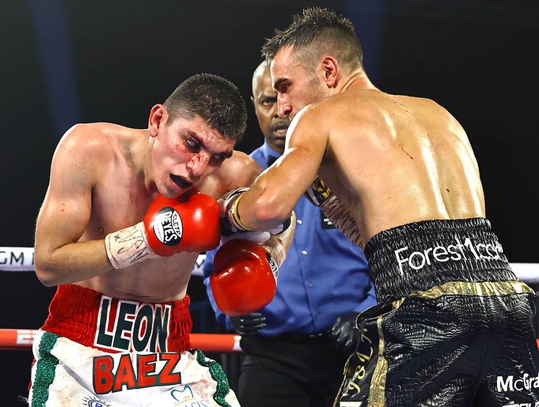 Jason Moloney, right, and Leonardo Baez fight Thursday, June 25, 2020, on a Top Rank boxing car ...