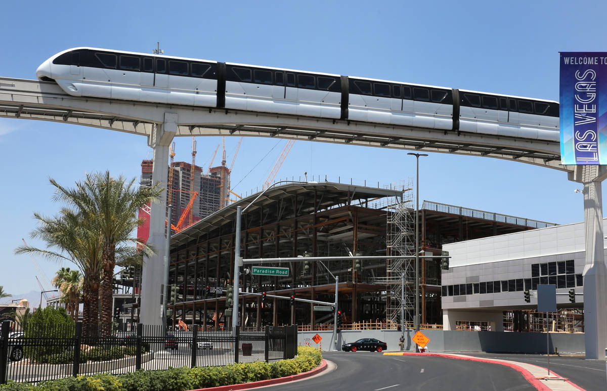 The Las Vegas Monorail runs past The Las Vegas Convention Center expansion on Tuesday, July 9, ...