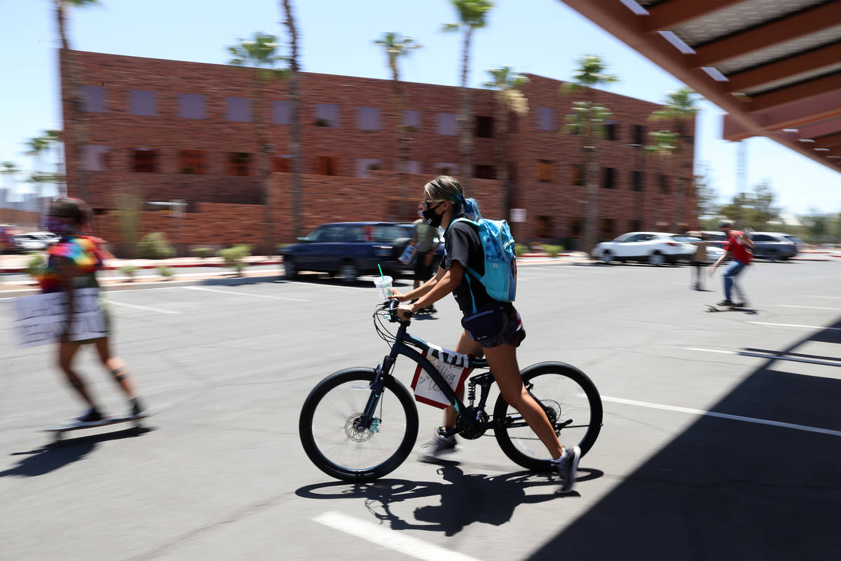 People begin the Black Lives Matter parade from the Clark County Government Center in Las Vegas ...