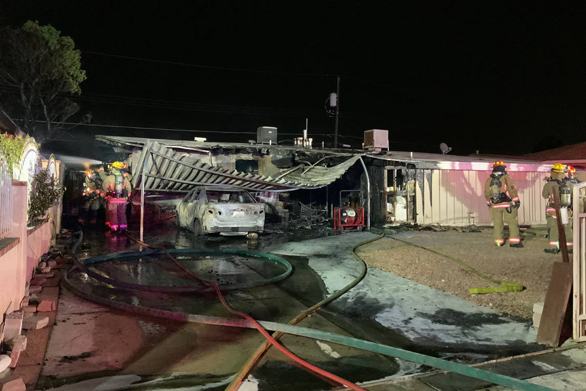 Crews battle a fire Sunday, June 28, 2020, on the 700 block of North 23rd Street in Las Vegas. ...