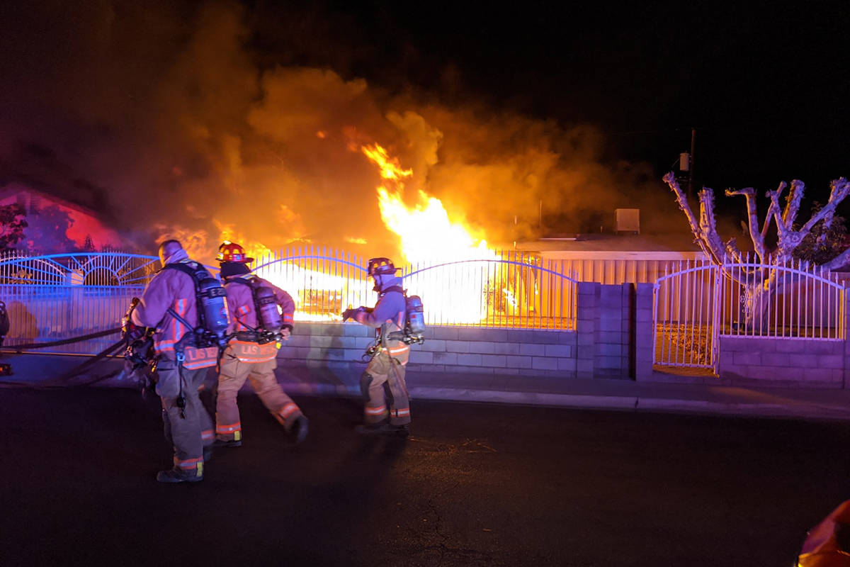 Crews battle a fire Sunday, June 28, 2020, on the 700 block of North 23rd Street in Las Vegas. ...