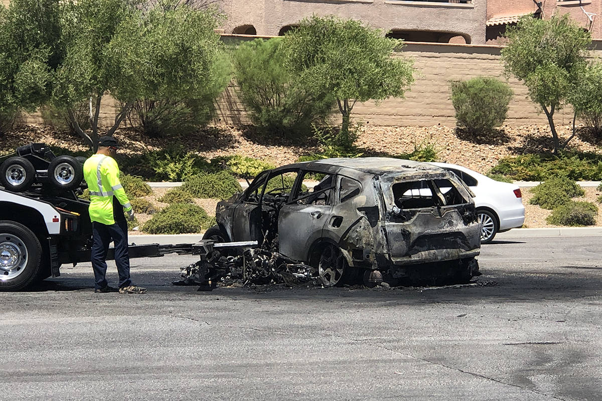 Police investigate a fiery crash involving a motorcycle and SUV on Sunday, June 28, 2020, on De ...