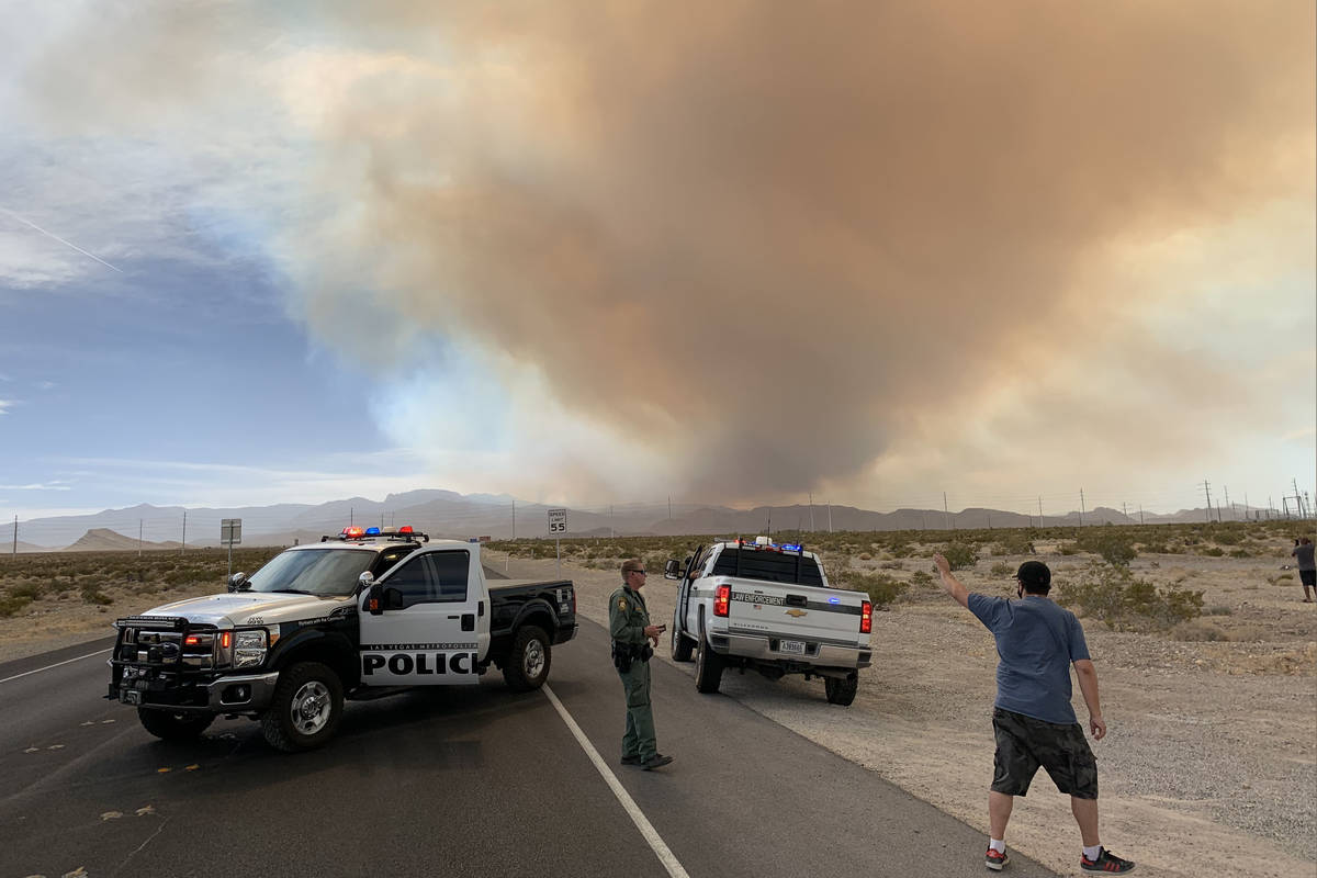 Smoke is seen from Kyle Canyon Road on Sunday, June 28, 2020, in northwest Las Vegas, after a f ...