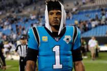 In this Sept. 13, 2019, file photo, Carolina Panthers quarterback Cam Newton (1) walks off the ...