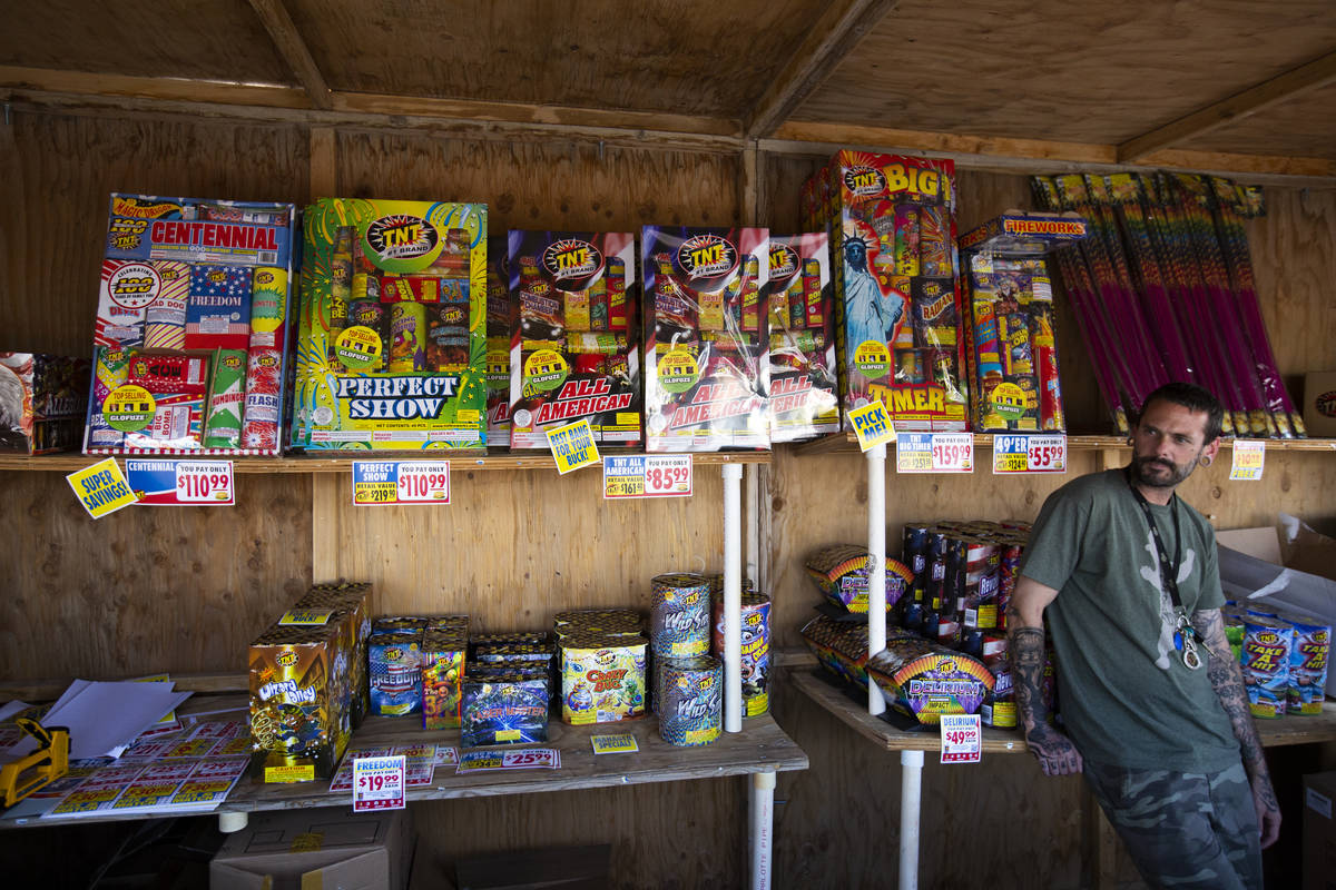 Jeremiah Wicker sits inside the fireworks booth for Freedom House Sober Living in Las Vegas on ...