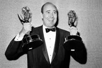 In this May 26, 1963 file photo, Carl Reiner shows holds two Emmy statuettes presented to him a ...