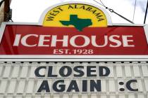 A sign outside the West Alabama Icehouse shows the bar is closed Monday, June 29, 2020, in Hous ...